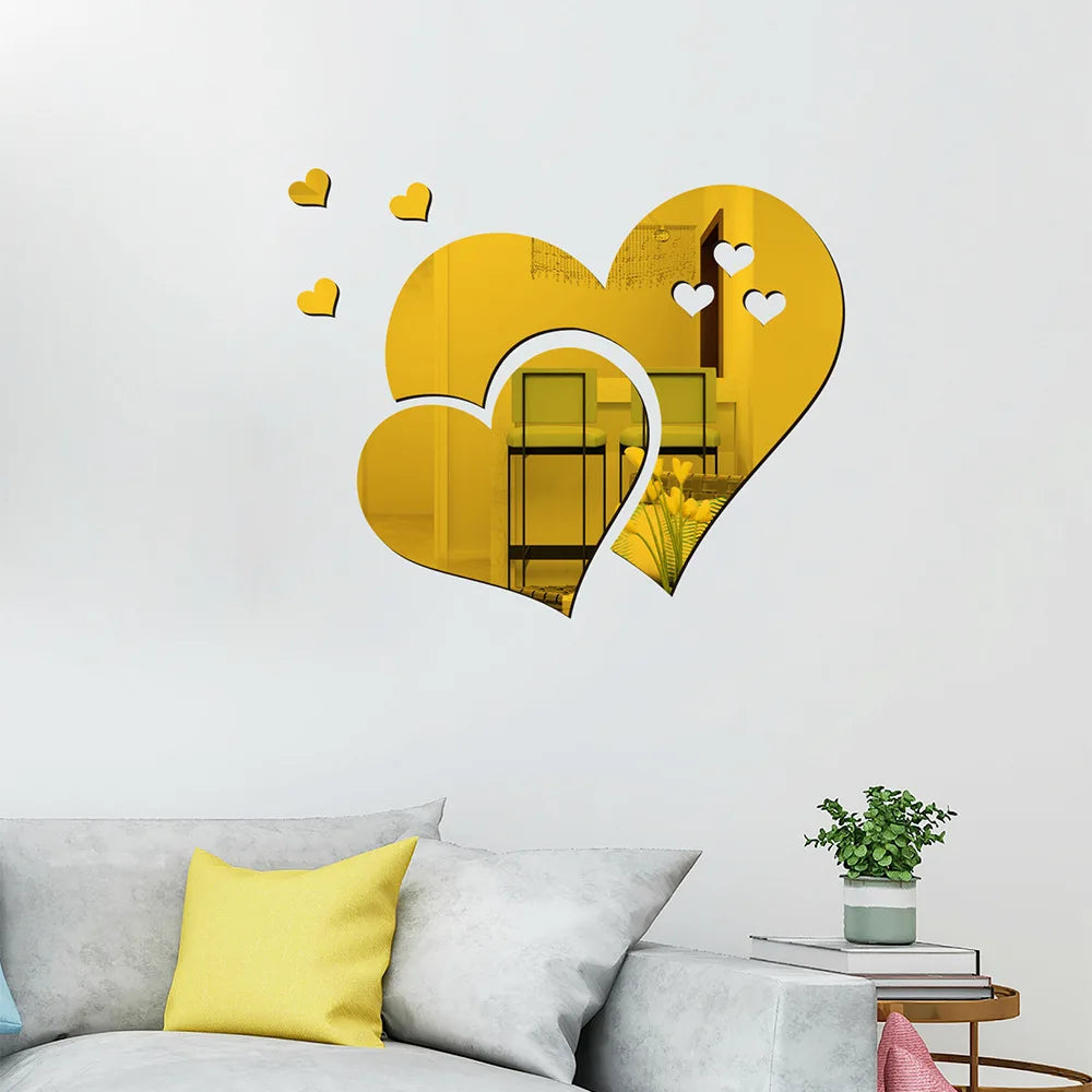 Gold heart wall art decal featuring a large heart shape with smaller hearts and yellow floral accents on a white wall.