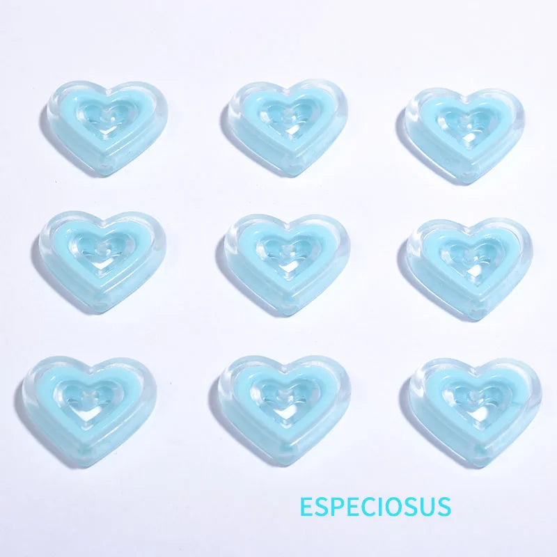 Six light blue heart-shaped acrylic charms arranged in a grid.