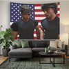 A framed poster featuring two muscular men in black athletic shirts against an American flag background.