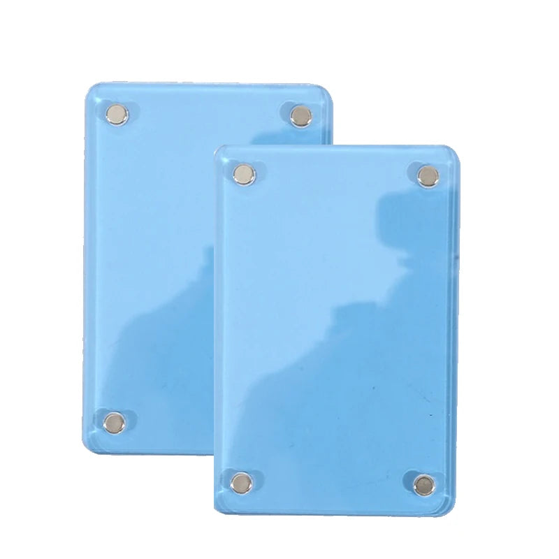 A set of three light blue photo clips used for interior decor