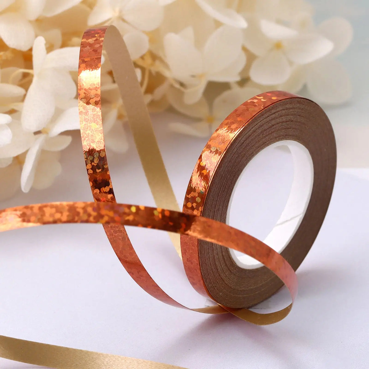 Roll of copper-colored satin ribbon for crafting or decoration