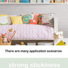 A pink bed decorated with various foam wall panels and decorative items on a shelf.