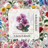 A transparent floral decal featuring a purple flower on a white background, with size measurements provided.