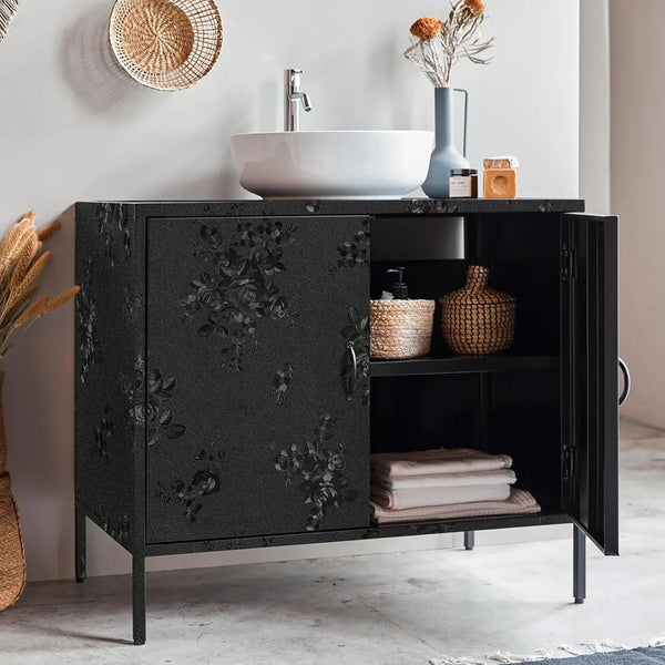 A black cabinet with floral contact paper features a white sink and modern faucet on a light gray wall.