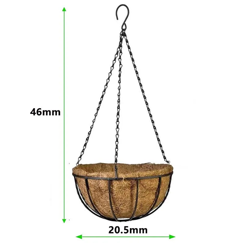 A metal hanging basket suspended by chains, featuring a woven coconut fiber liner.