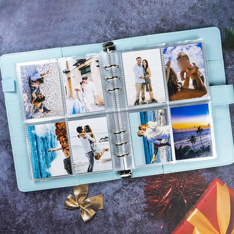 A light blue A5 PU leather photocard binder holding several photos and cards on a dark surface.