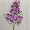 A vertical arrangement of lifelike butterfly orchid stems featuring numerous small purple and pink blooms on a green stem.