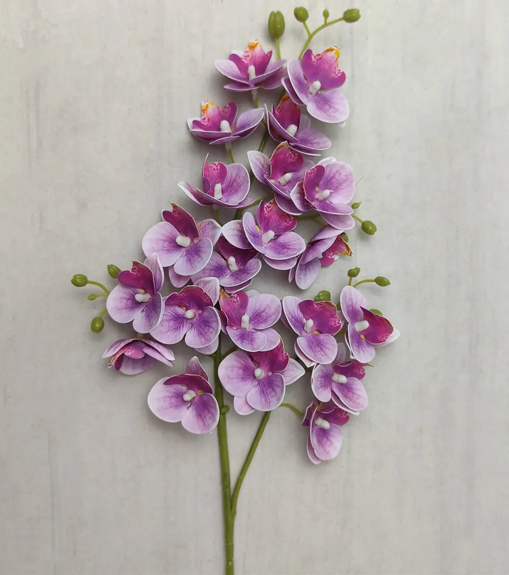 A vertical arrangement of lifelike butterfly orchid stems featuring numerous small purple and pink blooms on a green stem.