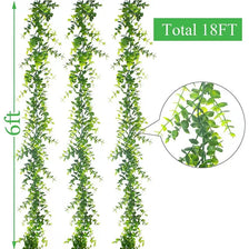 A vertical display of artificial green plant vines, measuring 18 feet in total length.
