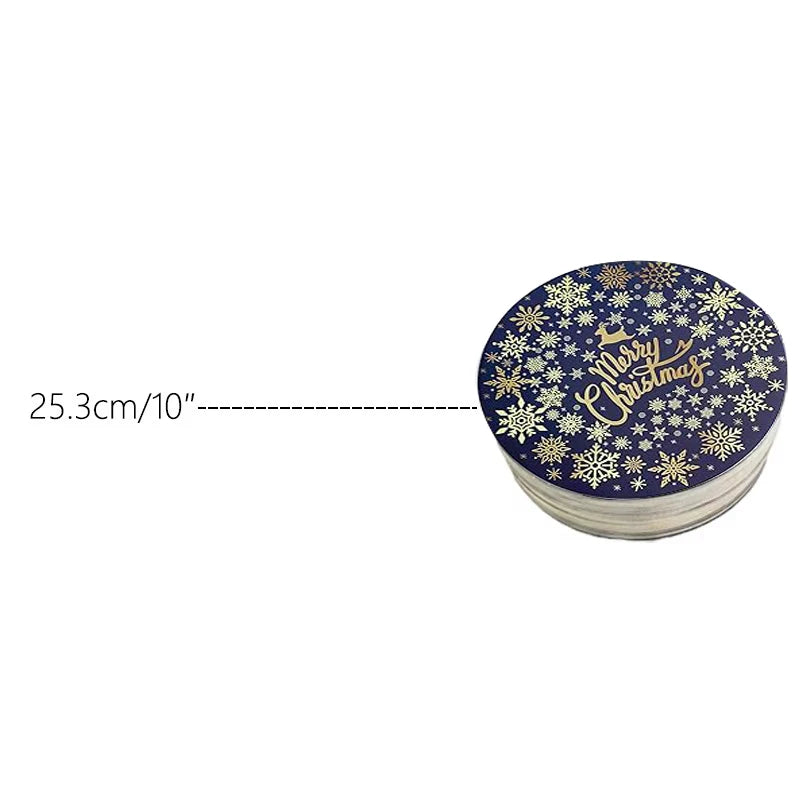 Round cardboard cake board decorated with gold snowflakes and Merry Christmas text