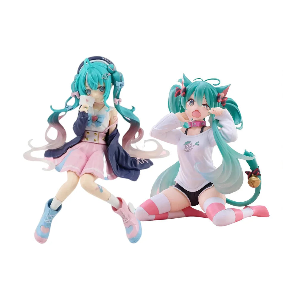 A figure of a Gothic Lolita Miku action fairy doll with teal hair and pink outfit.