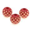 Three natural wooden beads with a red and tan checkered pattern for jewelry making