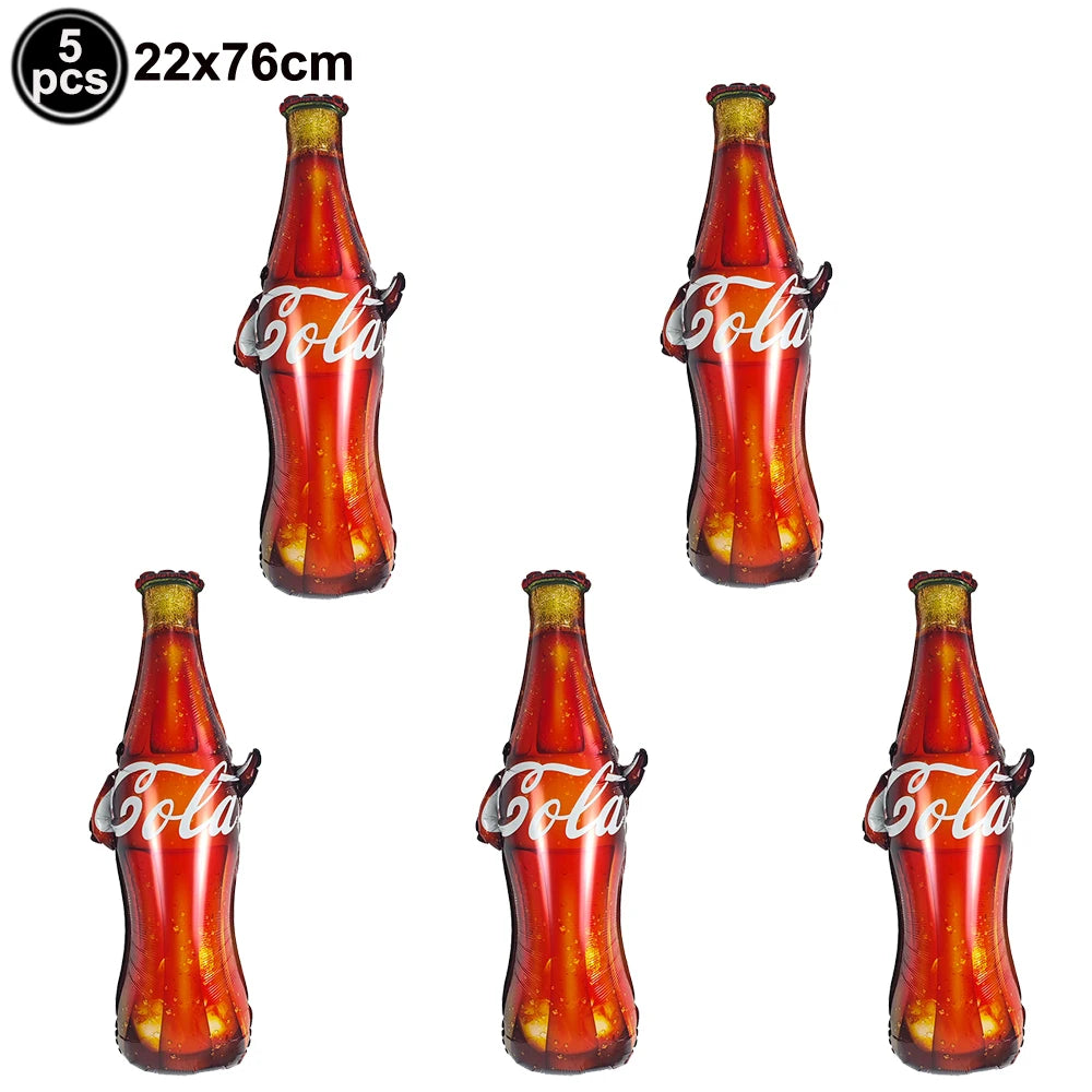 Set of five red glass or plastic tiki-style sunglasses and table mats for a luau party