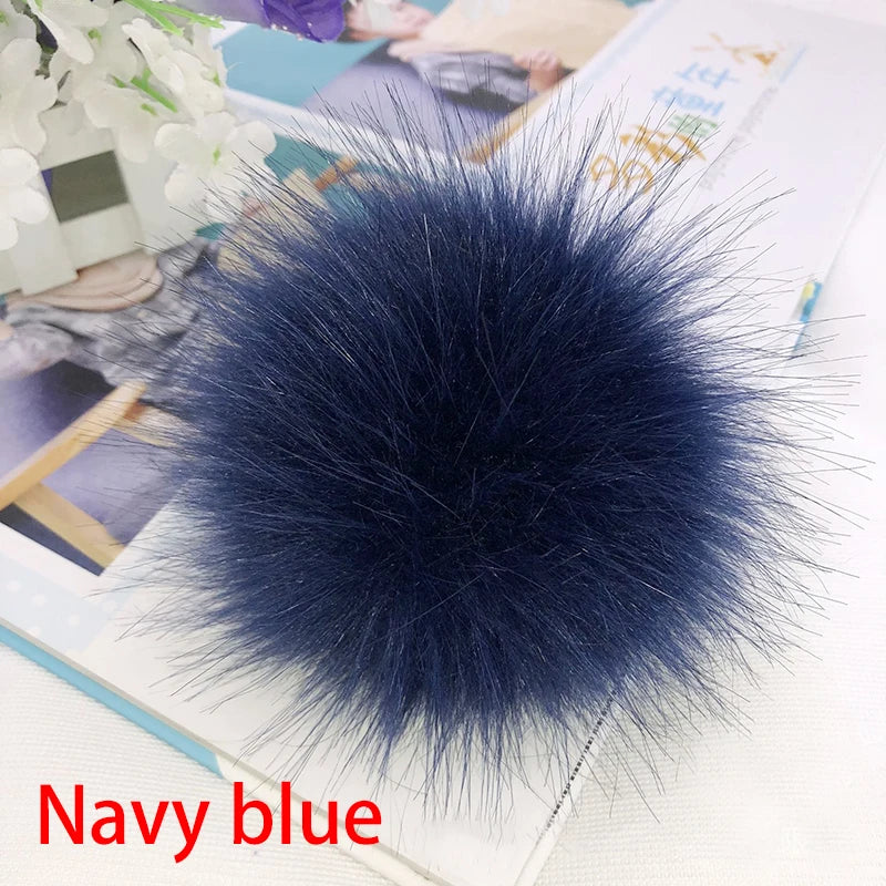 Accessoire boule de cheveux en fausse fourrure bleu marine
