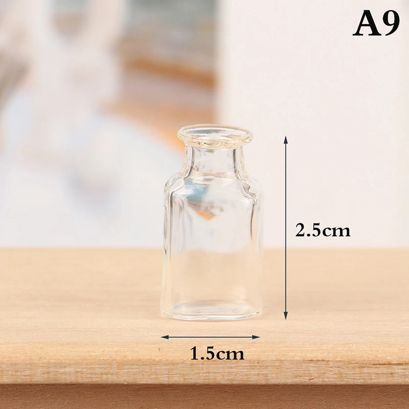 A clear glass bottle with a stopper and a narrow neck, shown on a wooden surface.