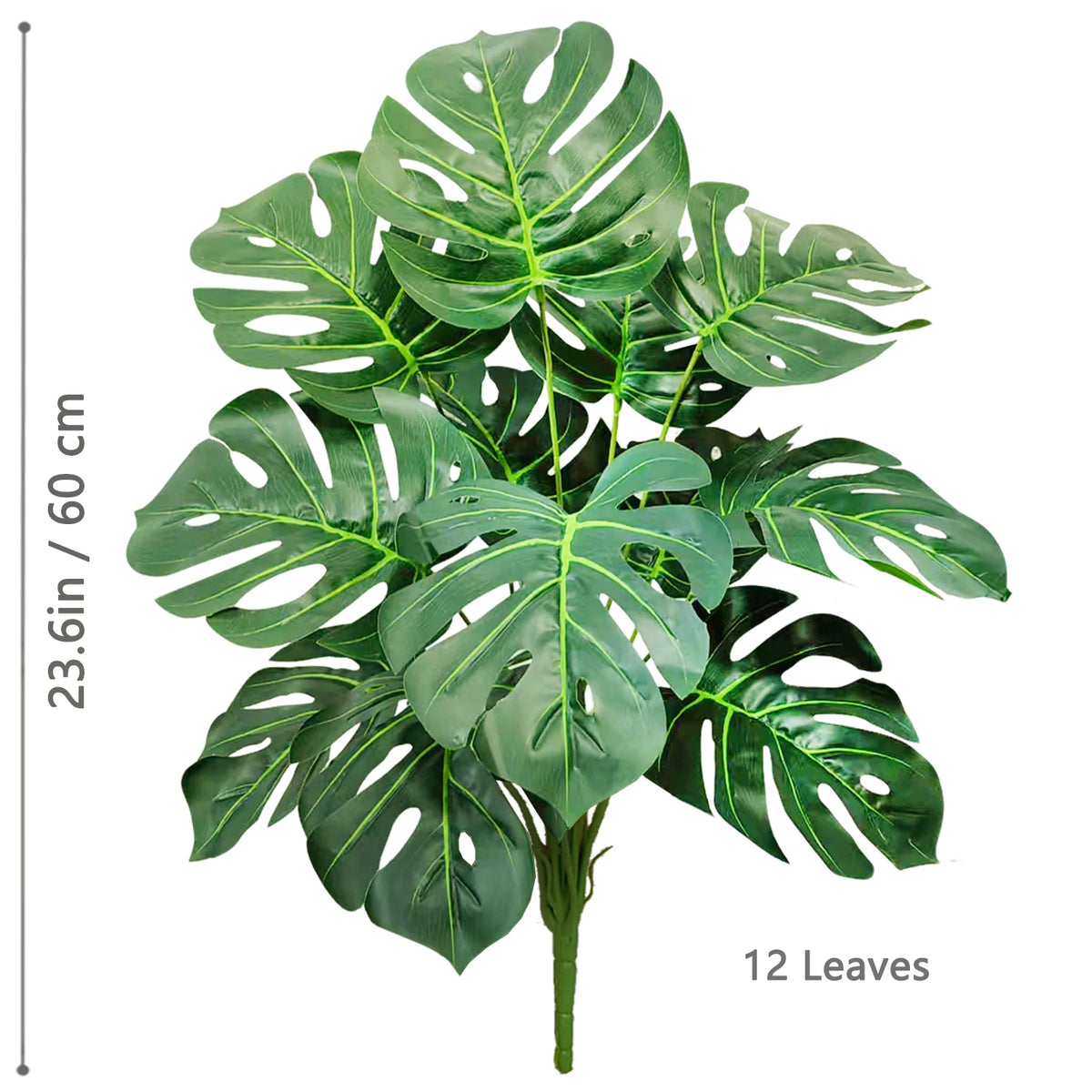 Artificial Monstera plant with silk green leaves shown against a white background.
