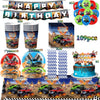 Monster truck birthday party decoration kit featuring a backdrop, plates, cups, and various truck models.