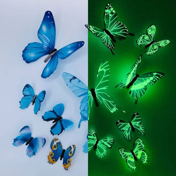 A collection of twelve luminous, iridescent butterfly wall stickers in various shades of blue and green.