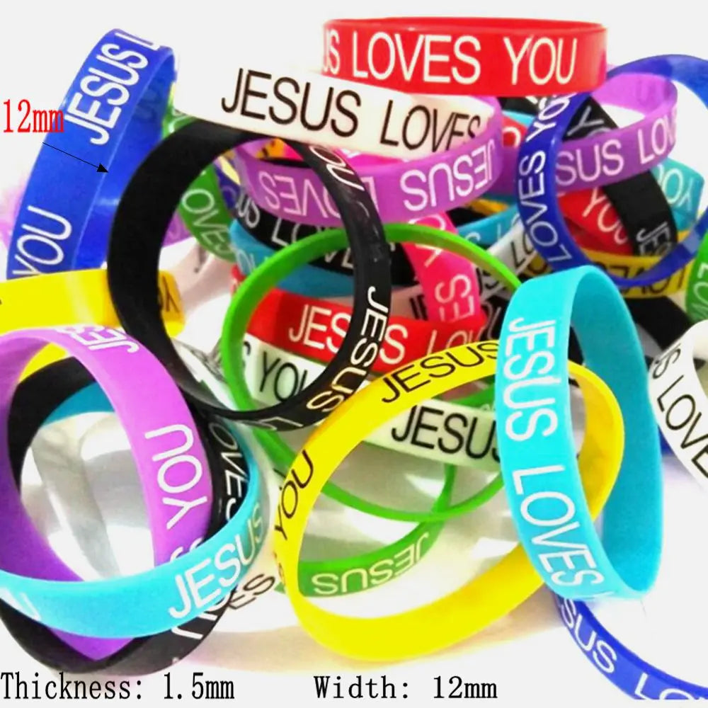 A collection of silicone bracelets featuring the Jesus Loves You design in various colors and thicknesses.