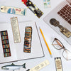 A collection of decorative cartoon reading bookmarks set featuring various designs and colors on a white background.