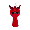 A red plush toy set shaped like a horned devil face with white string attached.