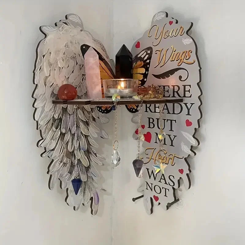 A boho wood angel wing wall shelf featuring a display holder with crystals and a heart message