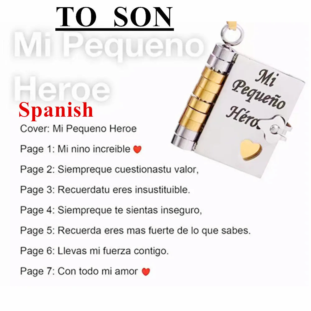 A silver pendant necklace featuring an openable book design with engraved Spanish text.