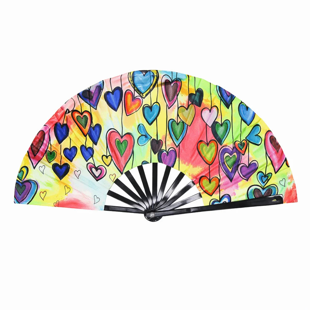 A folding rave hand fan with colorful heart-shaped cutouts in neon and bright colors.