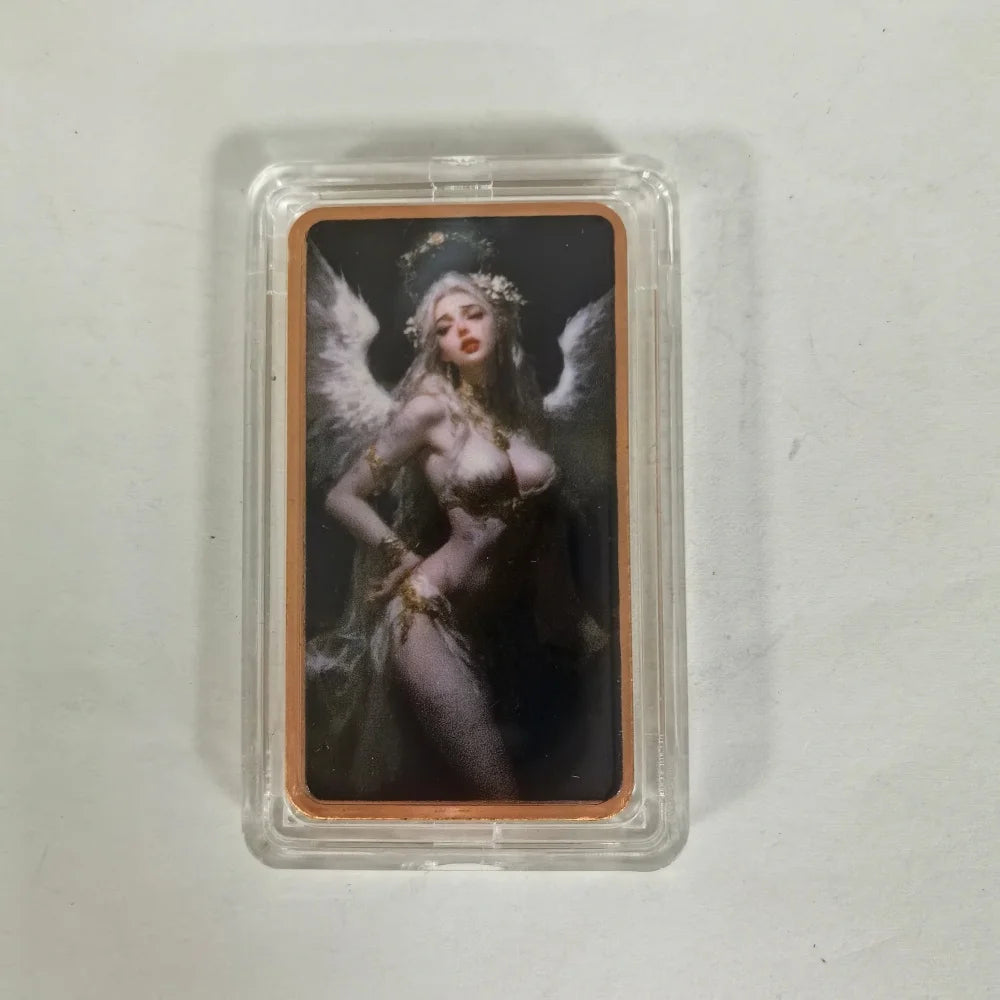 A fantasy art bar featuring a winged female figure in a protective plastic case.
