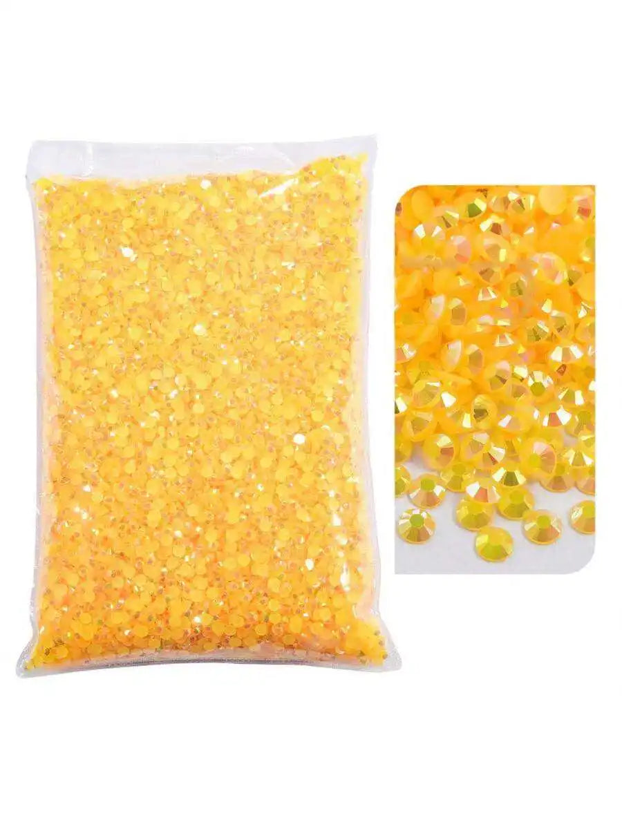 Bag of yellow resin rhinestones with varying sizes and shapes
