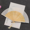 Traditional Bamboo Folding Fan with Solid Color Design