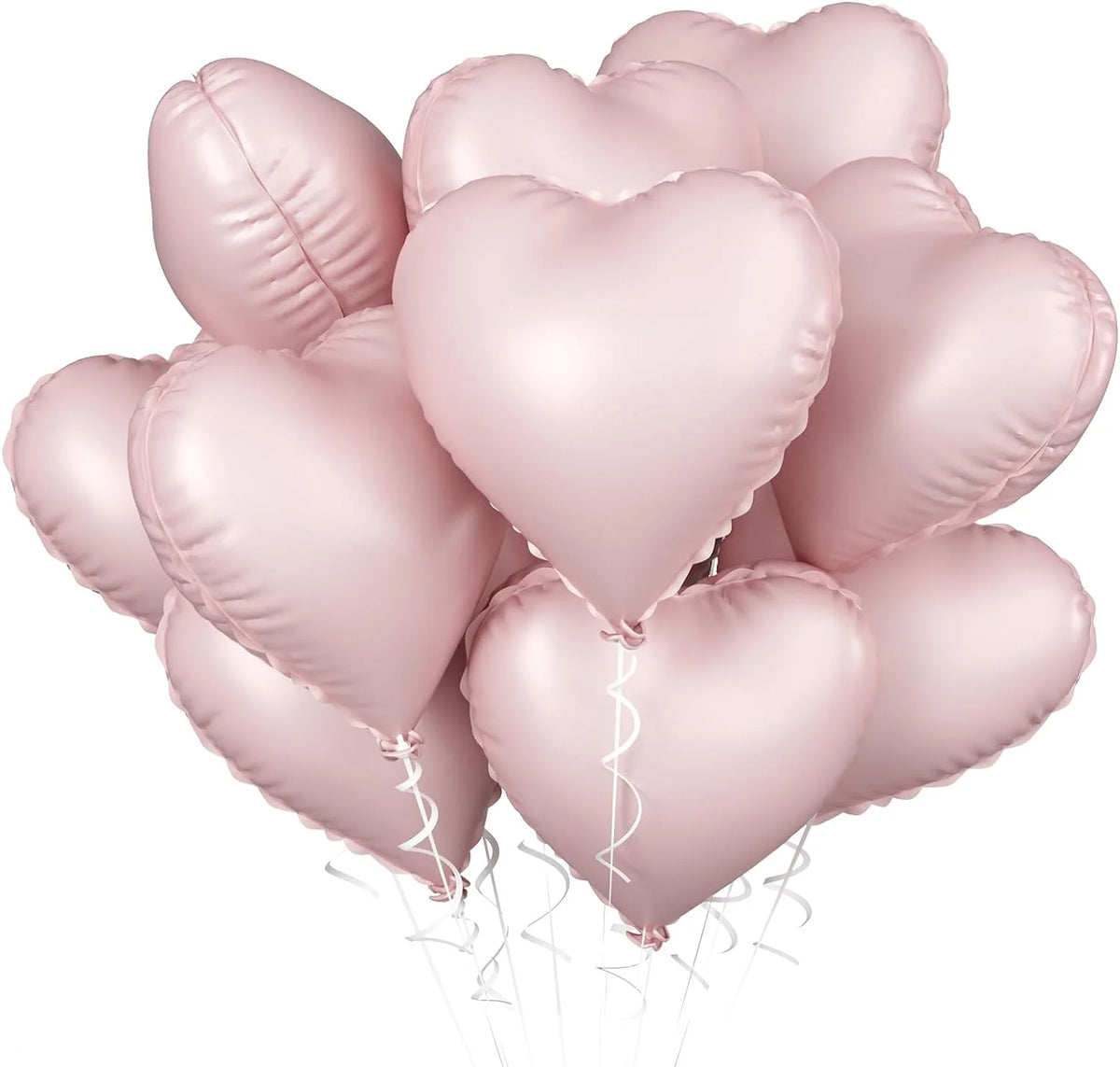 A cluster of pink heart-shaped foil balloons tied together for a celebration.