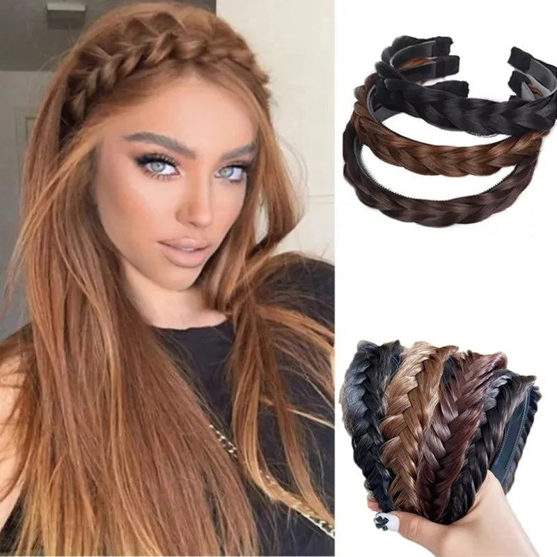 A woman shows off long brown hair styled with black and brown braided hair bands.