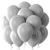 A cluster of pastel pink and blue latex balloons tied together for a party pack