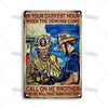 Vintage metal sign featuring two firefighters in yellow and blue uniforms against a dramatic blue sky.