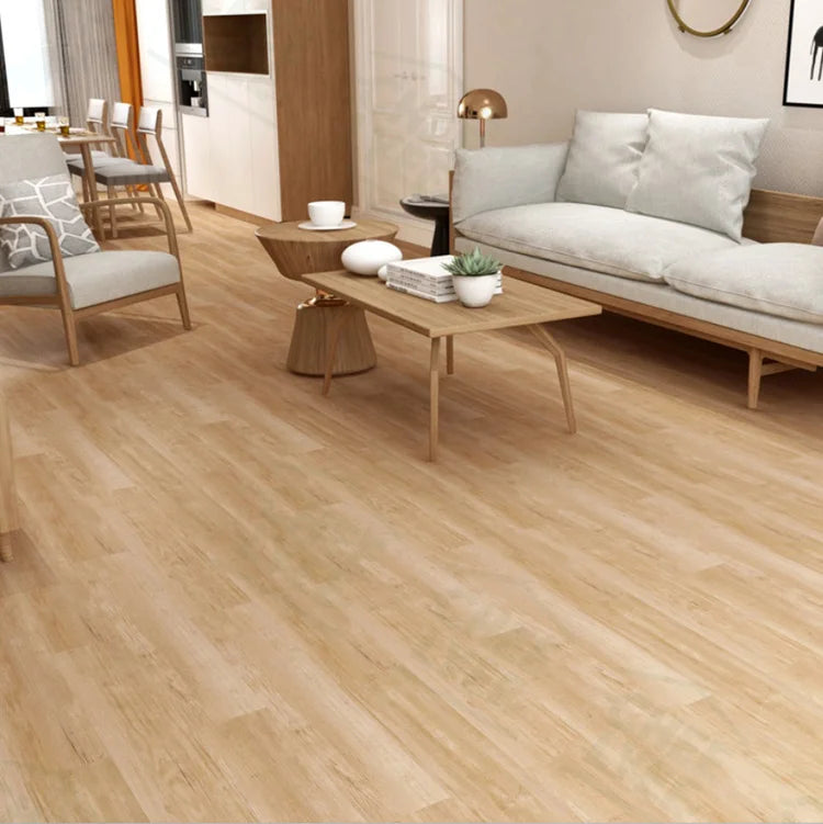 Light wood grain peel-and-stick flooring and wall stickers in a modern interior setting