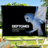 A black flag featuring a white illustration of an owl with diamond eyes.
