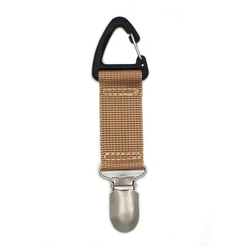 A portable straw hat clip featuring a black loop and a woven tan strap attached to a metal clip.