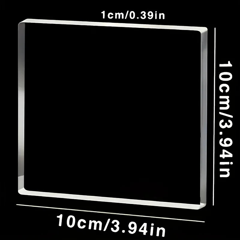 A square clear acrylic photo ornament with custom text engraved on the surface.