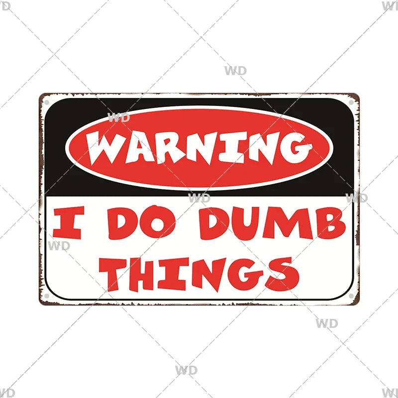 A vintage metal warning sign with a black background and red text that reads WARNING I DO DUMB THINGS.