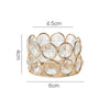 Gold-toned crystal lantern holder with a textured, round design.
