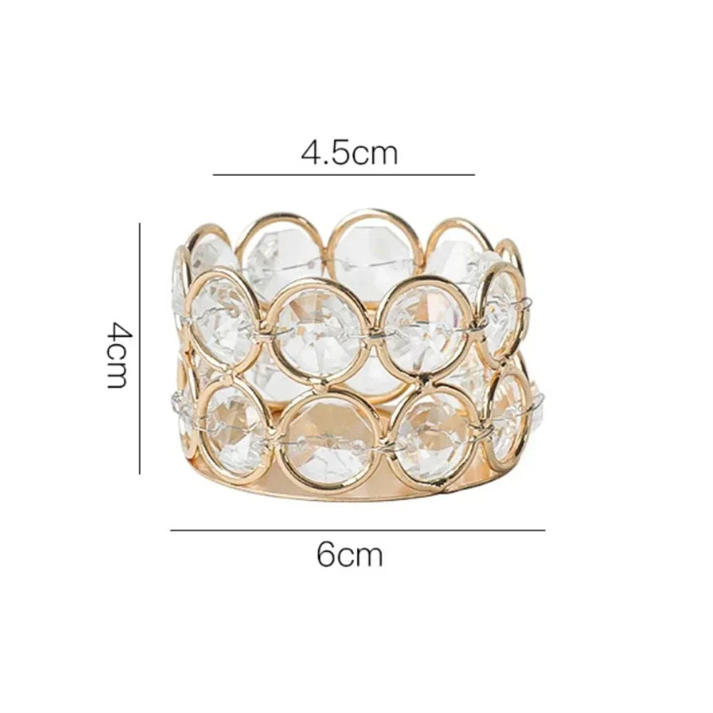 Gold-toned crystal lantern holder with a textured, round design.