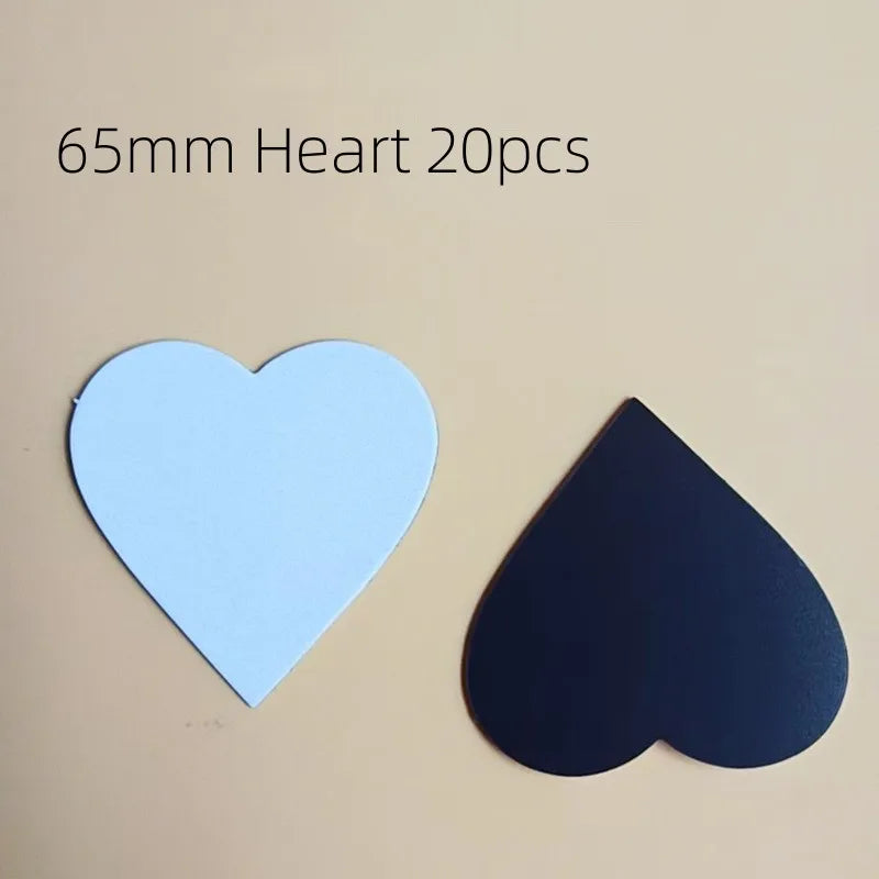A light blue heart shape and a black heart shape are displayed on a beige background.