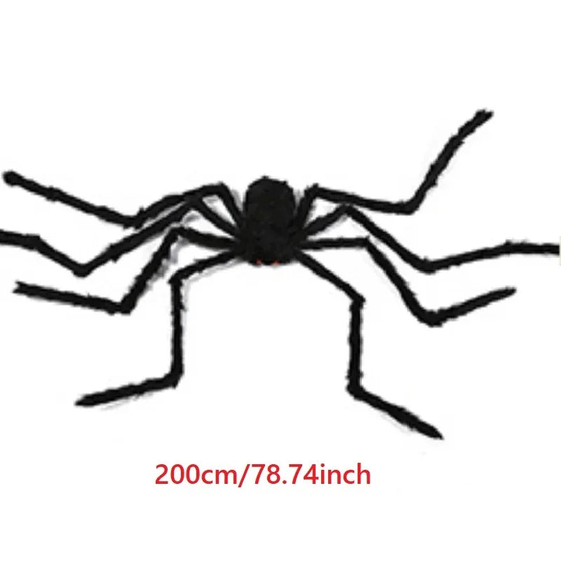 A large black plush spider decoration with eight legs against a white background.