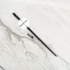 A black metal magic wand replica with a 36cm length lying on a white marble surface.