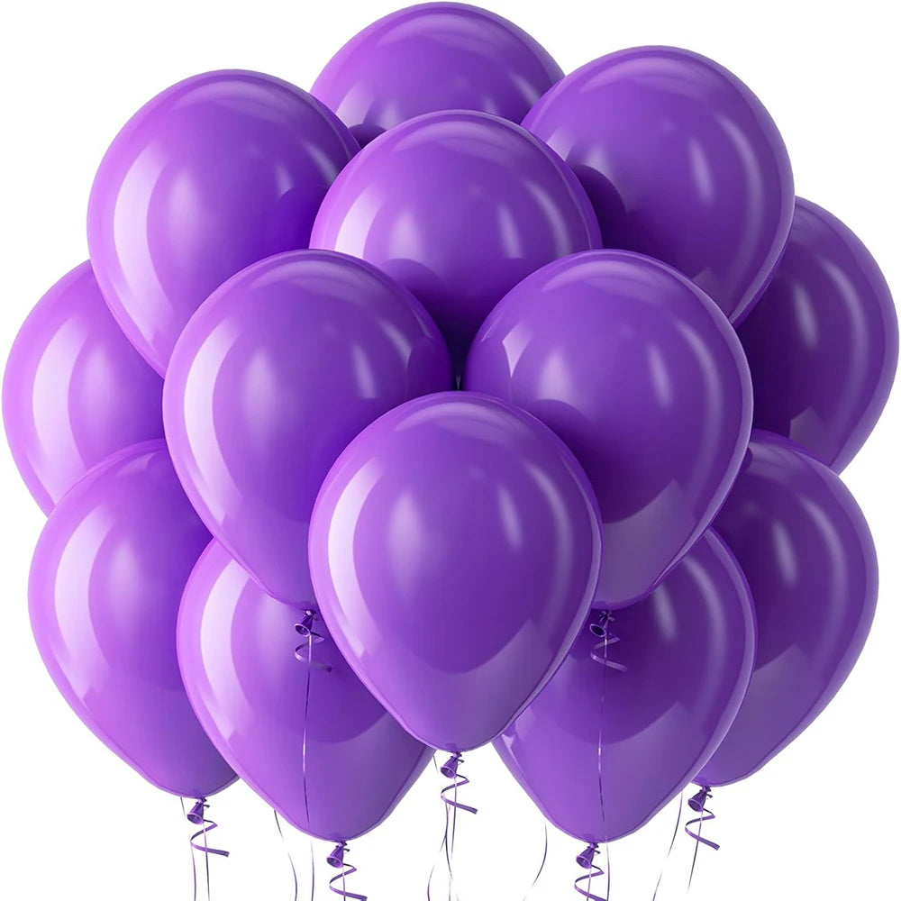 A cluster of purple latex balloons, some heart-shaped, floating against a white background.