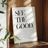 A framed inspirational quote canvas wall art poster with black text on a white background set in a wooden frame.