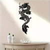 Black metal dragon wall art featuring a fierce mythical creature mounted on a light-colored wall.