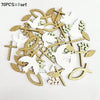 A set of 70 pieces of gold and white die-cut shapes for faith and celebration party decor