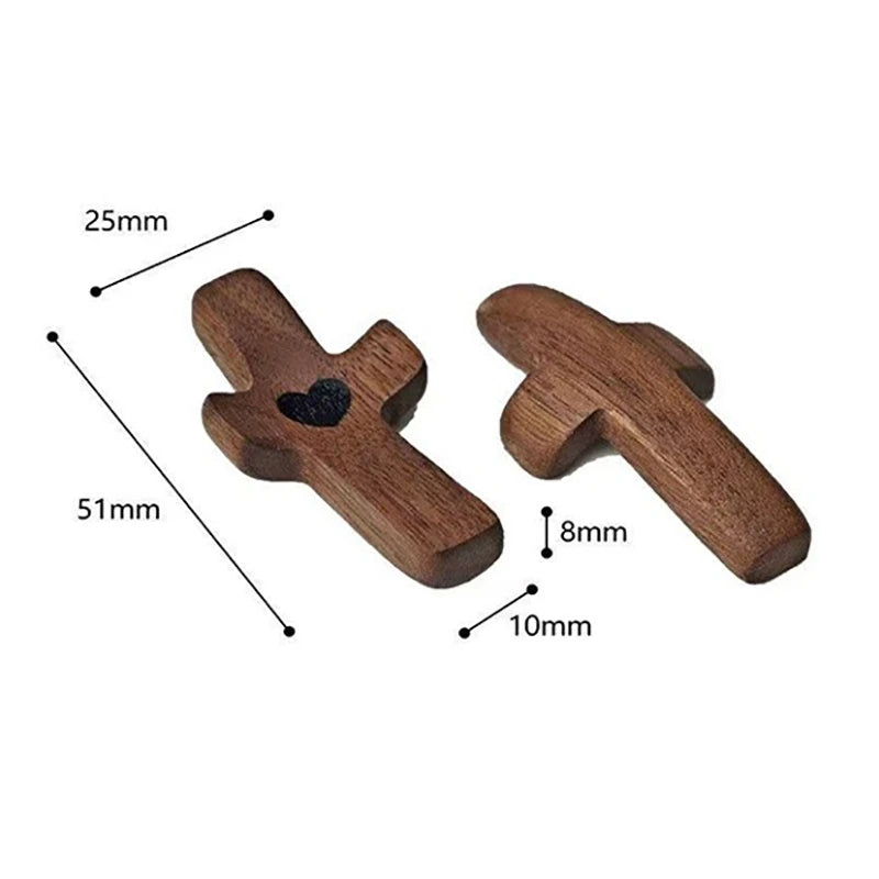 A wooden cross with an epoxy heart, shown with various dimension lines.